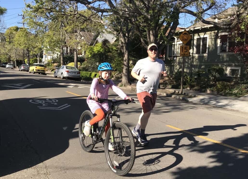 Father daughter Oakland open streets bicycling safely during coronavirus