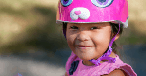 girl in pink helmet header