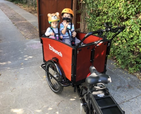 Ashley Lorden riding e-bikes with kids