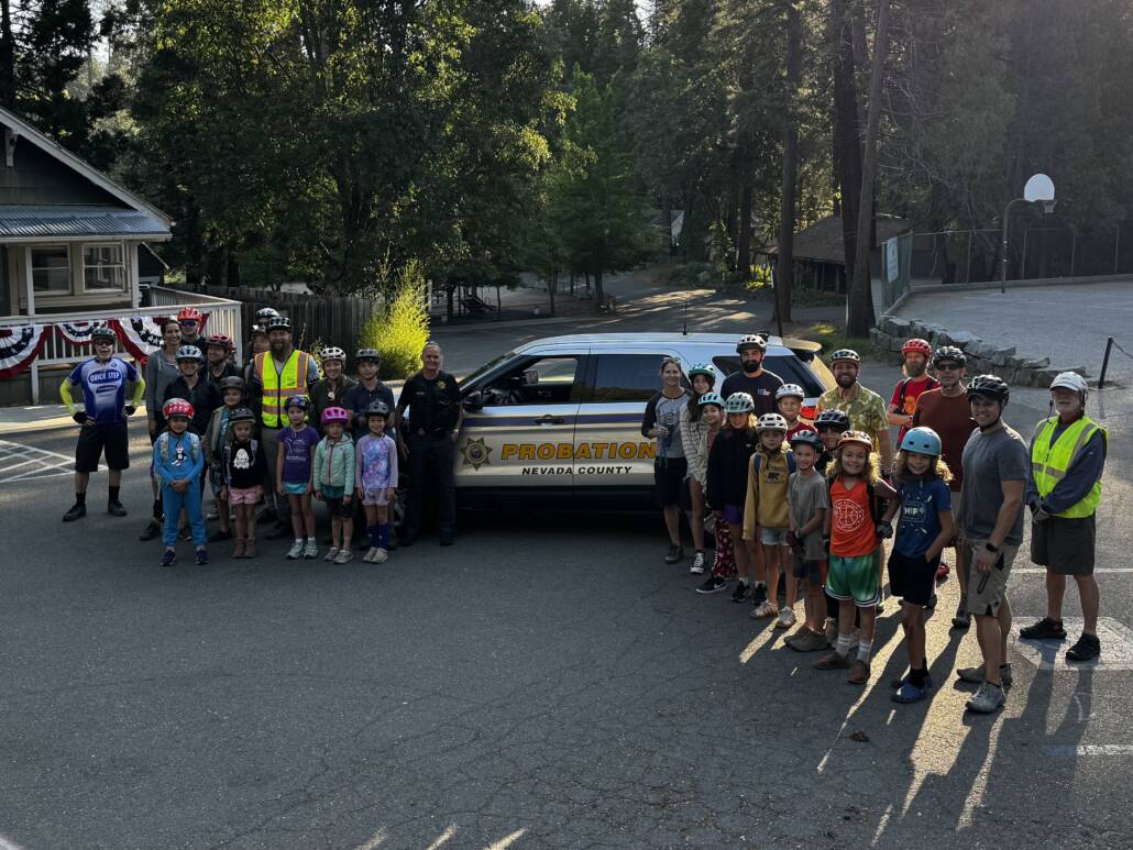 Nevada County probation officers escorting a bike bus. 